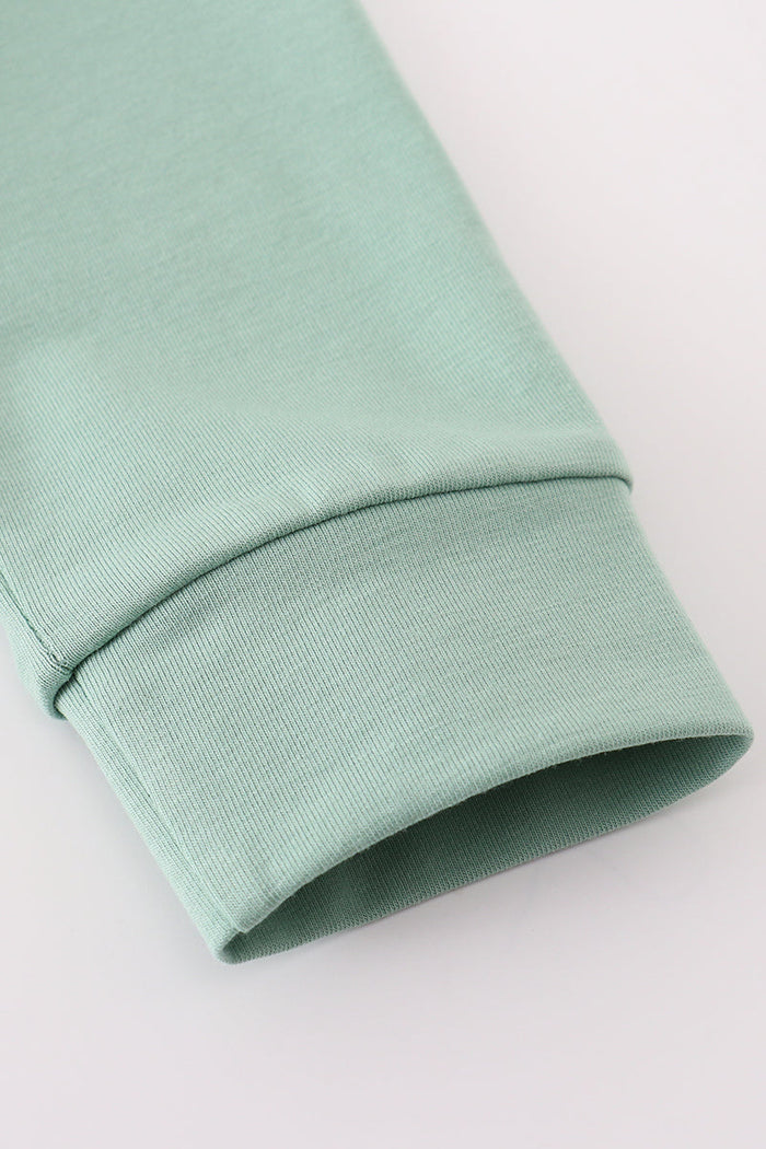 Sage pumpkin french knot top