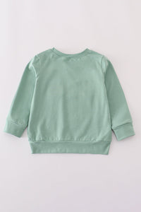 Sage pumpkin french knot top