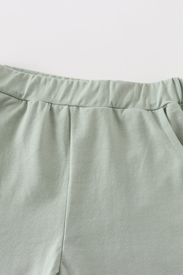 Sage basic ruffle shorts