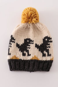 Black pompom dinosaur cable beanie