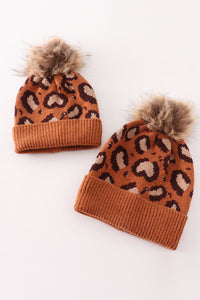 Brown pompom leopard cable beanie