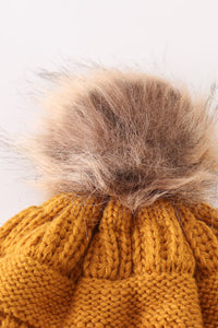 Mustard pompom cable beanie