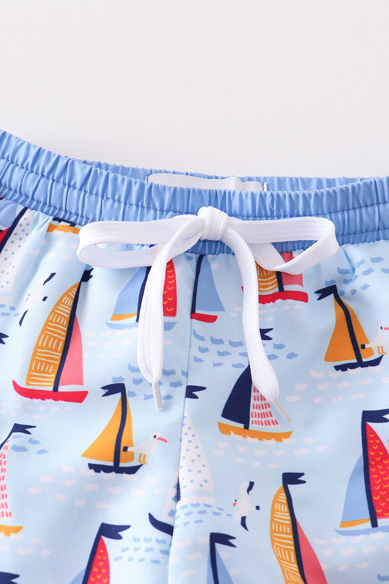 Blue sailboat print boy swim trunk